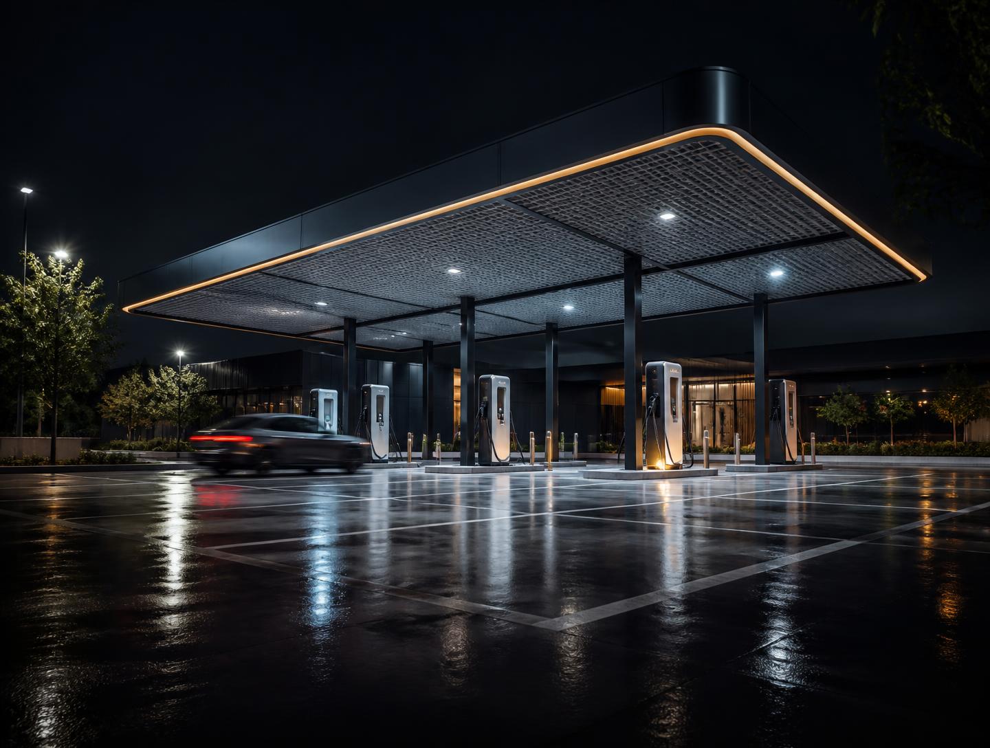DC fast EV charging stalls in a municipal parking lot at dusk